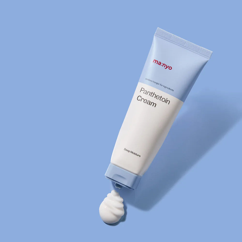 Panthetoin Cream tube with open nozzle and cream on fingertip