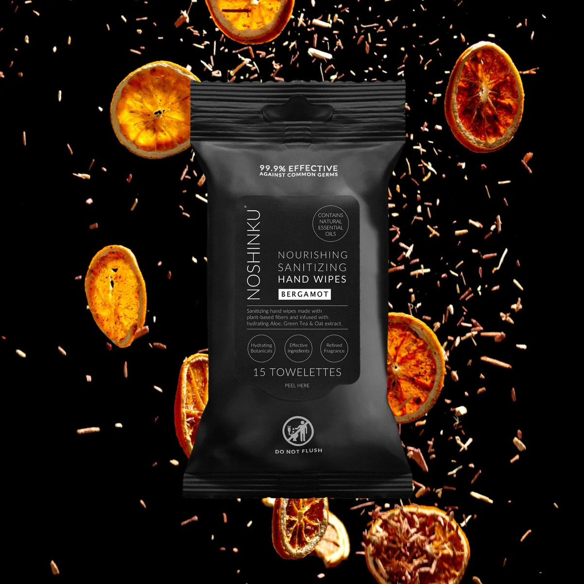 a black bag with orange slices and sprinkles