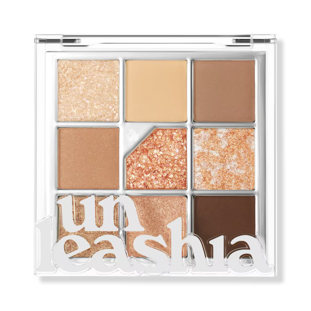 Nine-pan glitter eye palette with nude, tan, chocolate, rose-gold, and warm brown shimmer