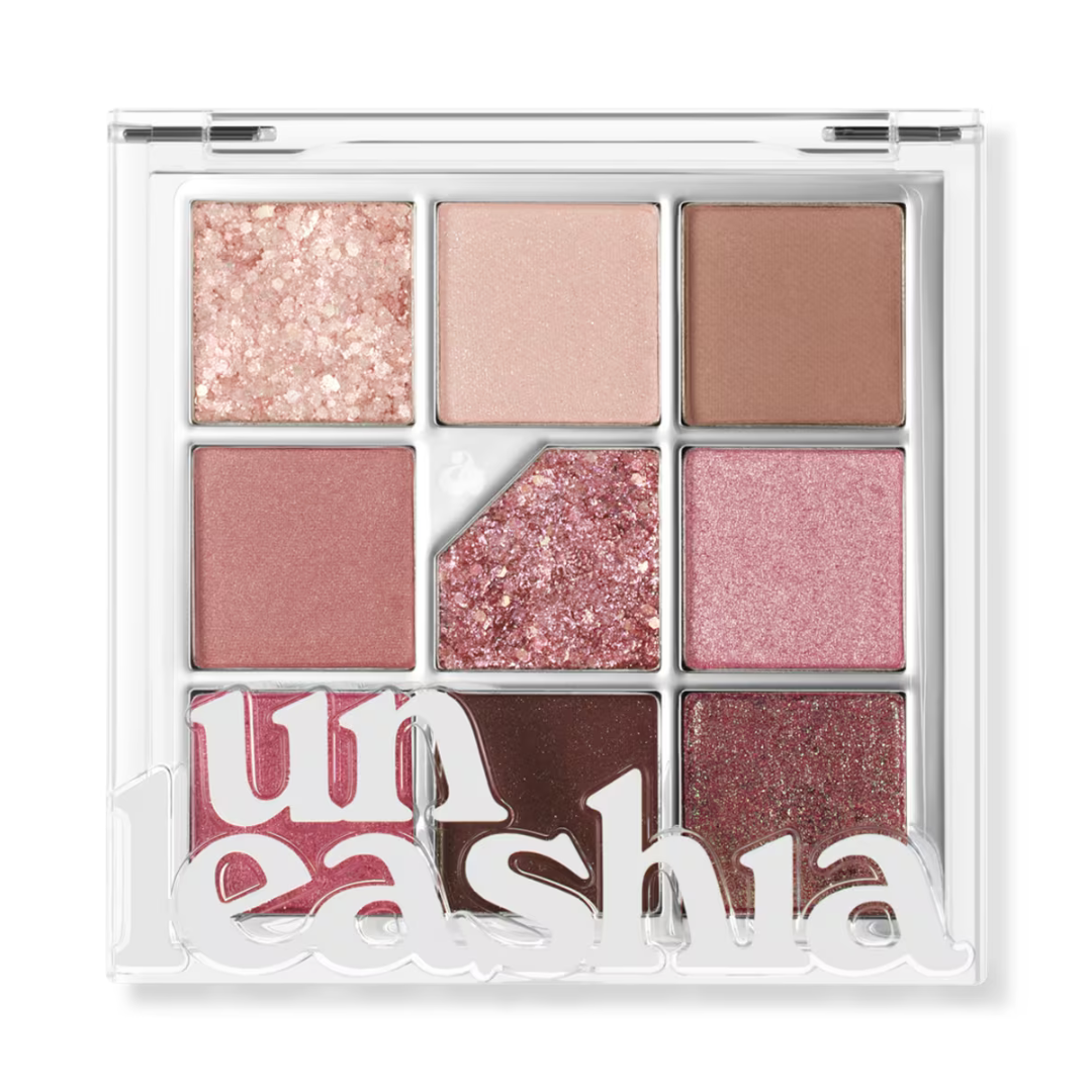 Nine-pan glitter eye palette with pale pink, rose, dusty mauve, and deep brown shades