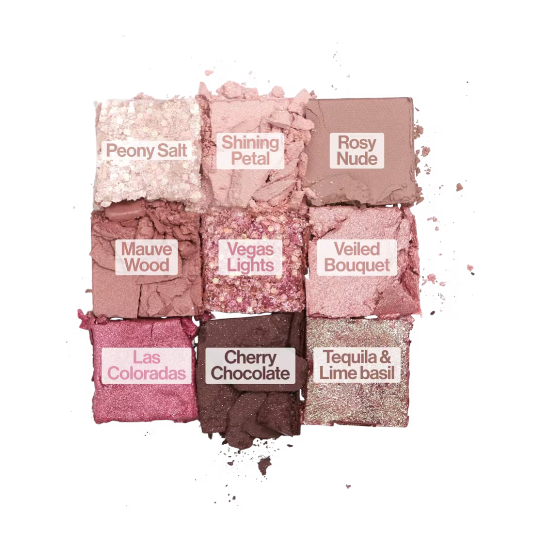 Nine pressed eyeshadow shades in blush, rose, mauve, berry, and dark plum tones