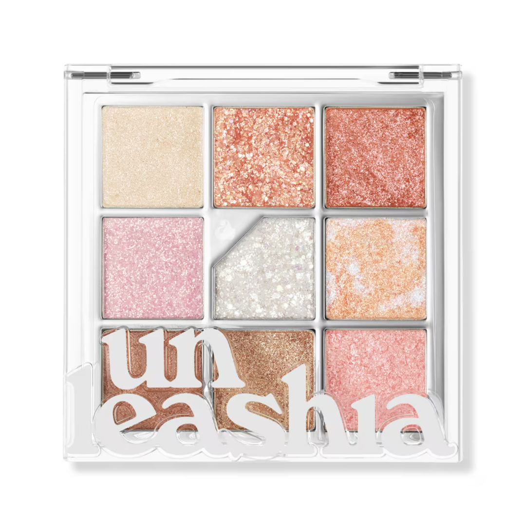 Nine-pan glitter eye palette with beige, rose gold, coral, pink, lavender, and bronze shades
