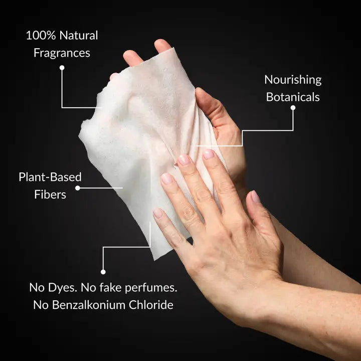 a person wiping their hands with a tissue
