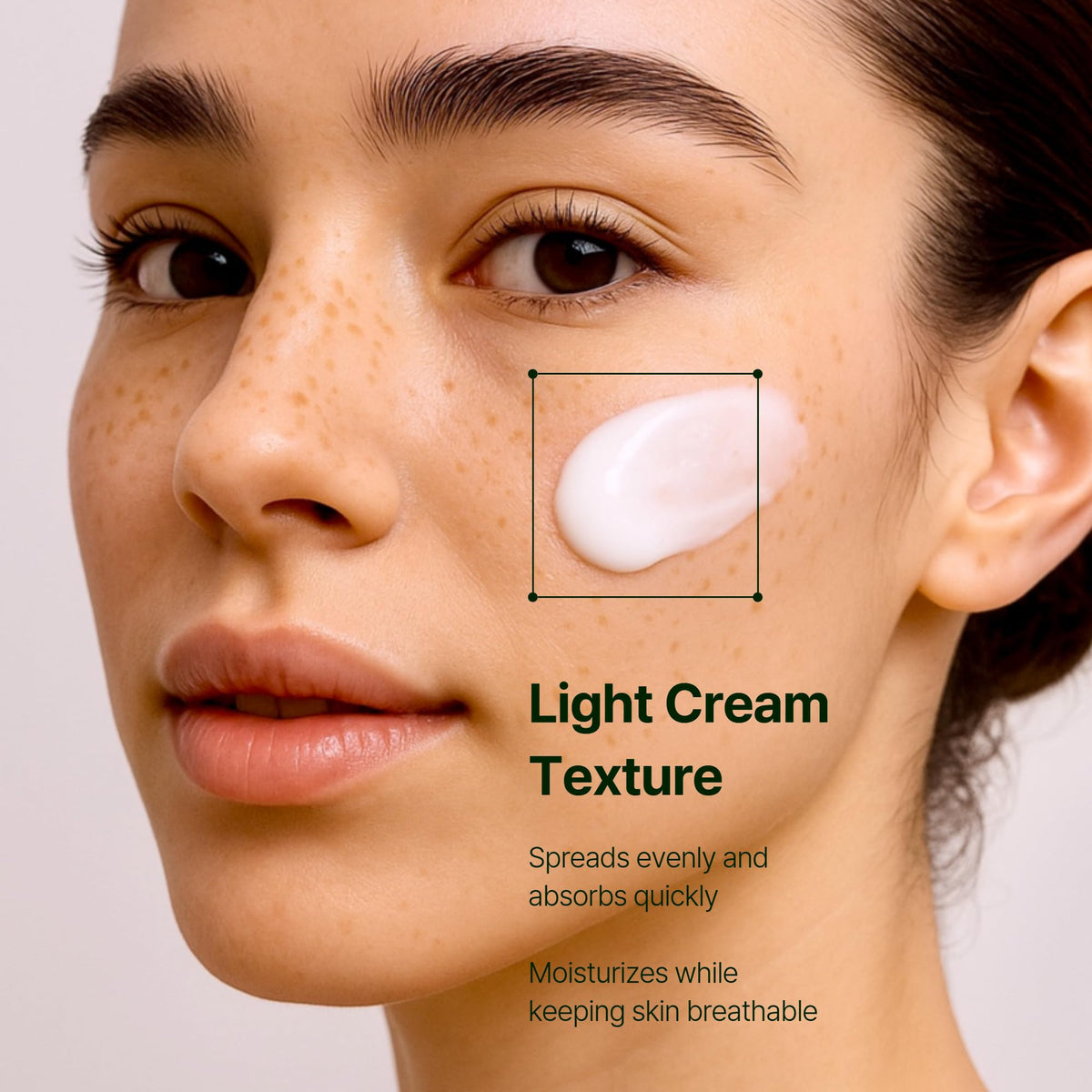 Facial moisturizer on cheek, woman close-up with light cream texture swab