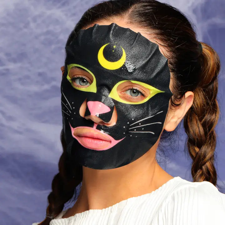 Black cat character sheet facial mask with yellow crescent moon and whiskers