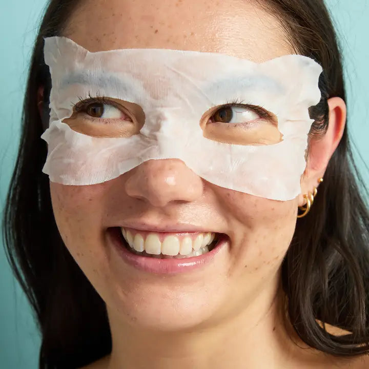 Person wearing white under-eye masks