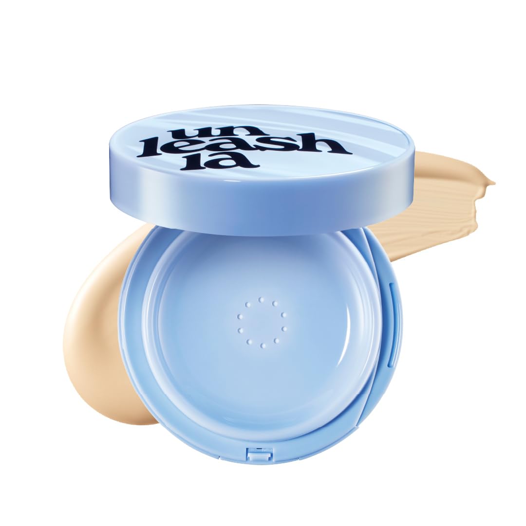 Blue cushion compact with open lid and visible cushion puff in powder well