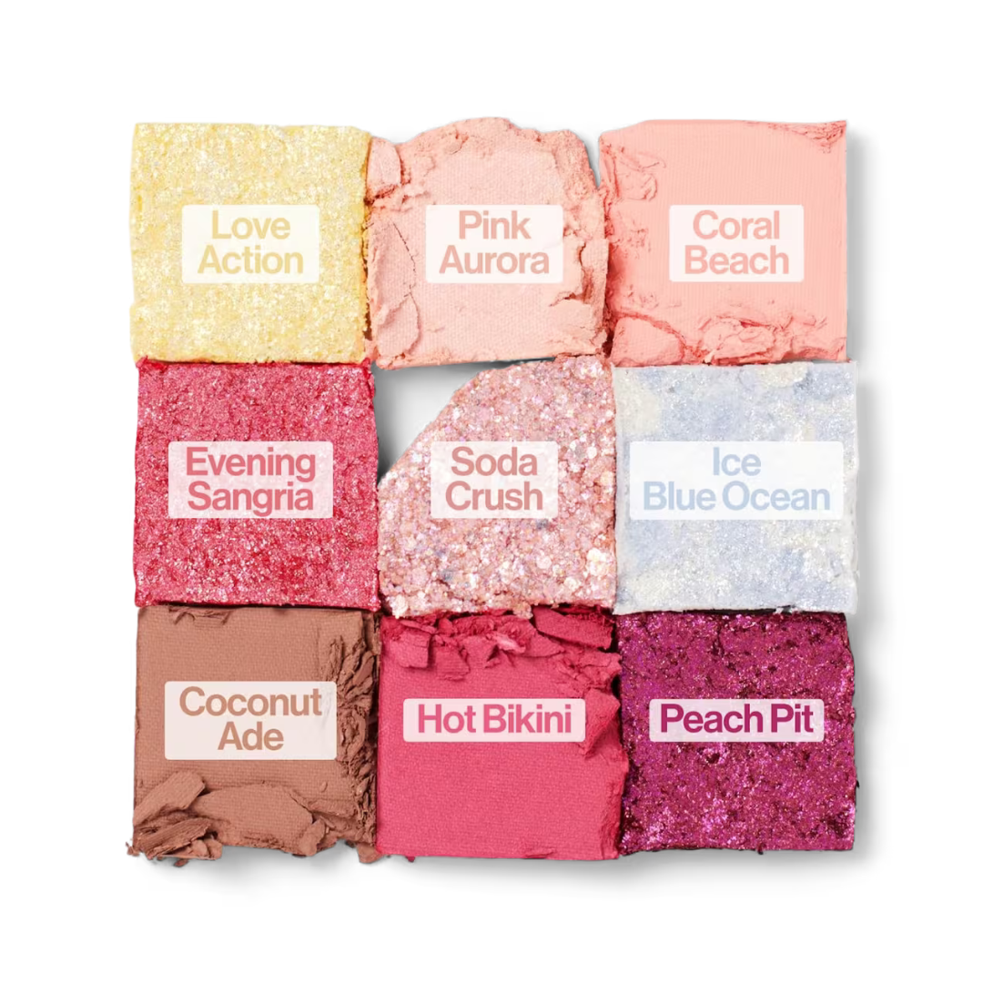 Eyeshadow palette shade swatches in yellow, pink, coral, red, brown, and blue glitter