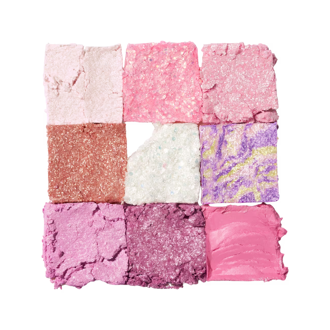 Nine-piece eyeshadow pan set with pastel pink, purple, peach, and gold glitter