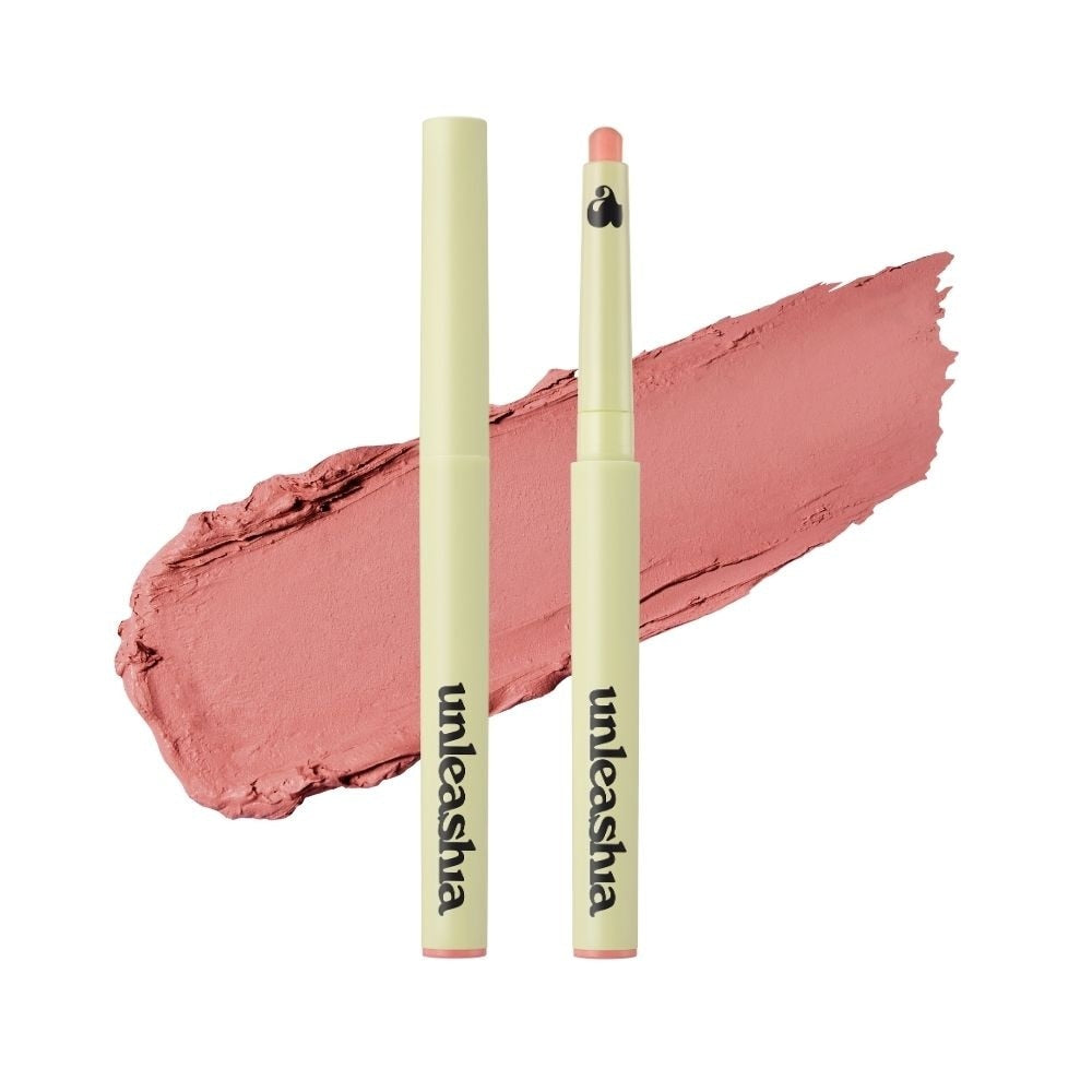 Matte lip pencil in dusty rose shade, open cap with broad swatch